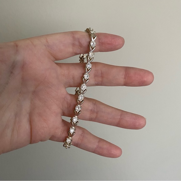 Avon Silver-Toned Tennis Bracelet with Cubic Zirconia Embellishments - Picture 1 of 7